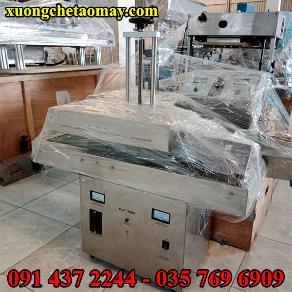 Máy dán miệng hủ nhựa chính hãng